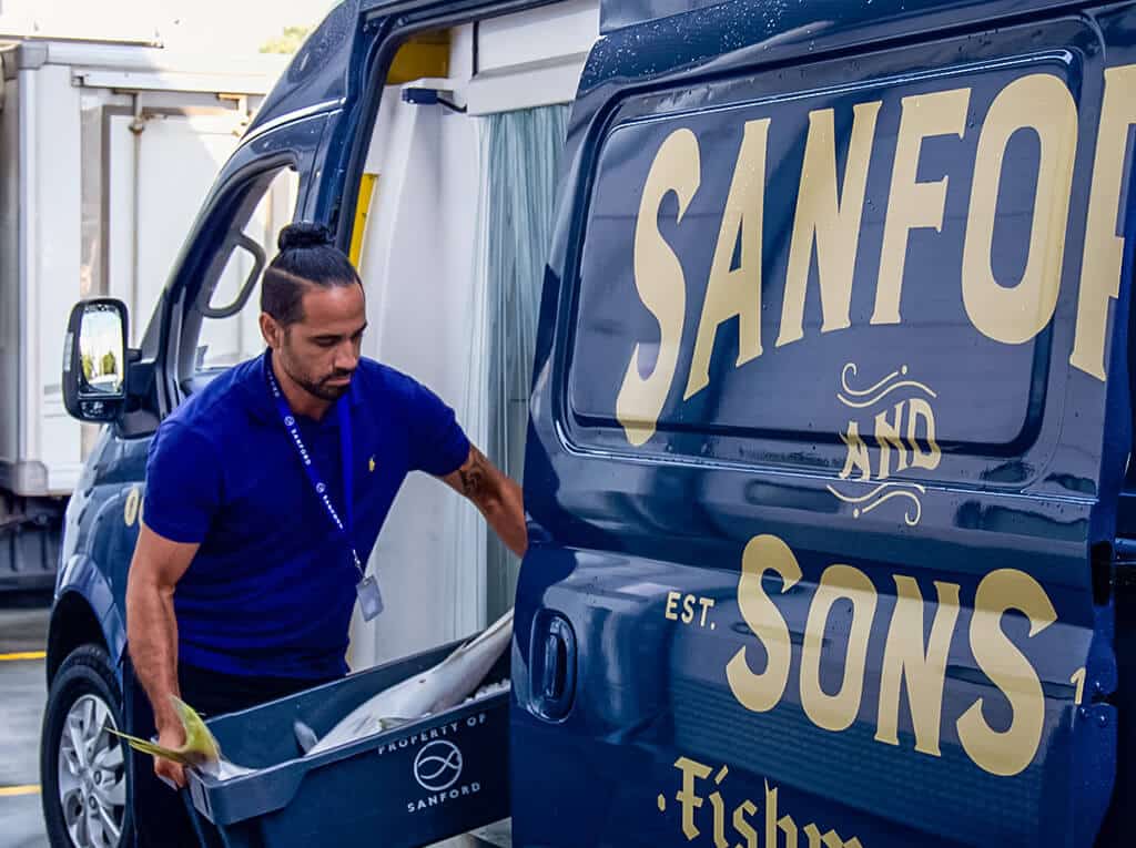 Sanford Courier delivery van and driver